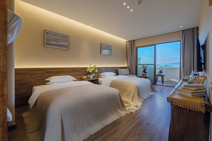 Imagen de la habitación del Hotel Dali Buxi Wellness Villa. Foto 2