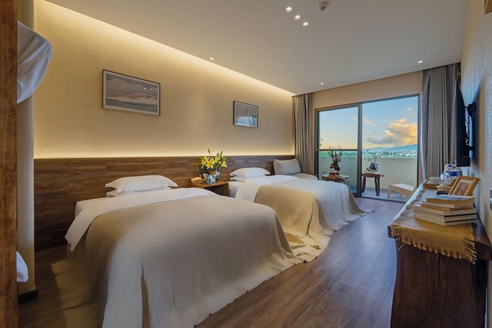 Imagen de la habitación del Hotel Dali Buxi Wellness Villa. Foto 3