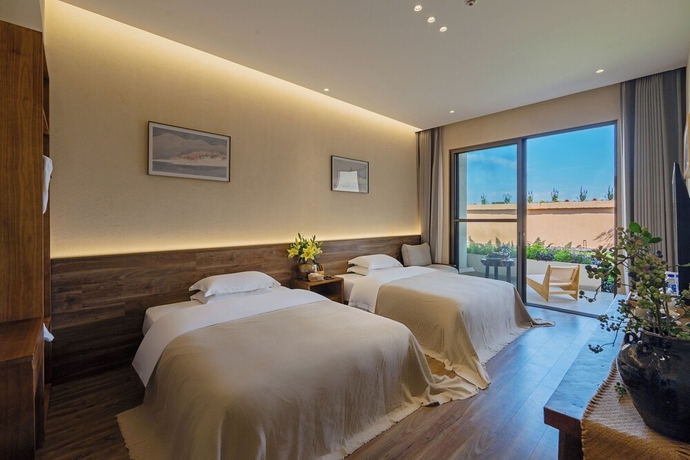 Imagen de la habitación del Hotel Dali Buxi Wellness Villa. Foto 6