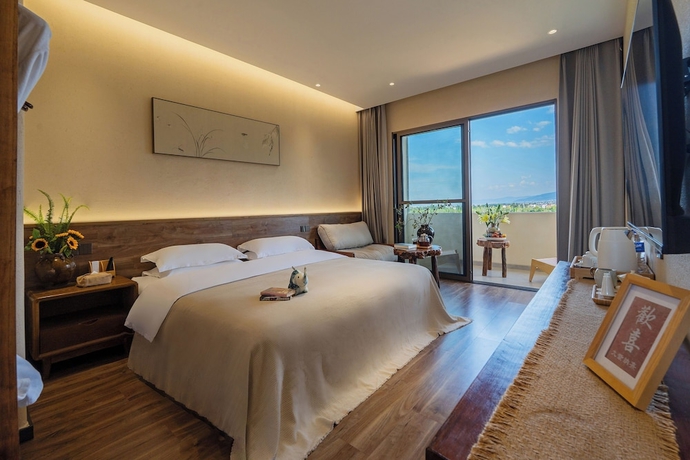 Imagen de la habitación del Hotel Dali Buxi Wellness Villa. Foto 8