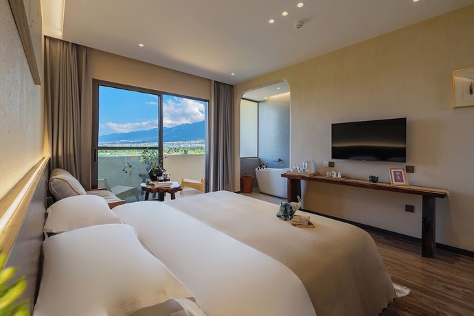 Imagen de la habitación del Hotel Dali Buxi Wellness Villa. Foto 9