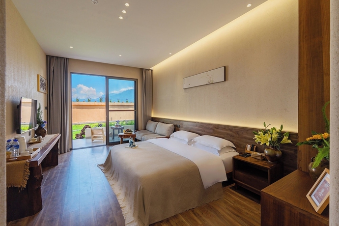 Imagen de la habitación del Hotel Dali Buxi Wellness Villa. Foto 10
