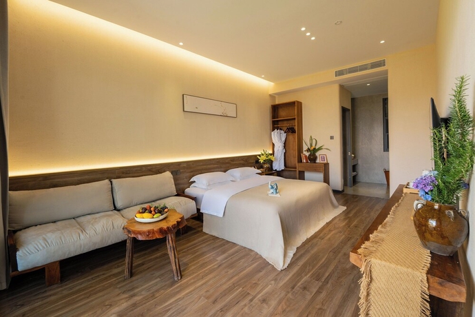 Imagen de la habitación del Hotel Dali Buxi Wellness Villa. Foto 12