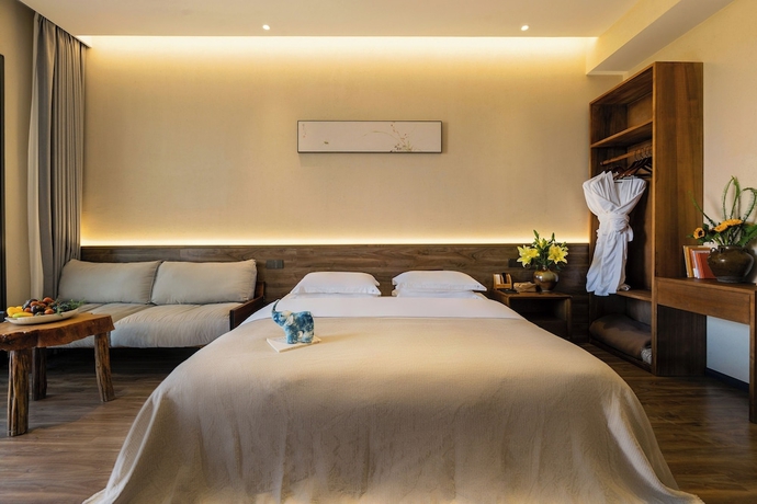 Imagen de la habitación del Hotel Dali Buxi Wellness Villa. Foto 13