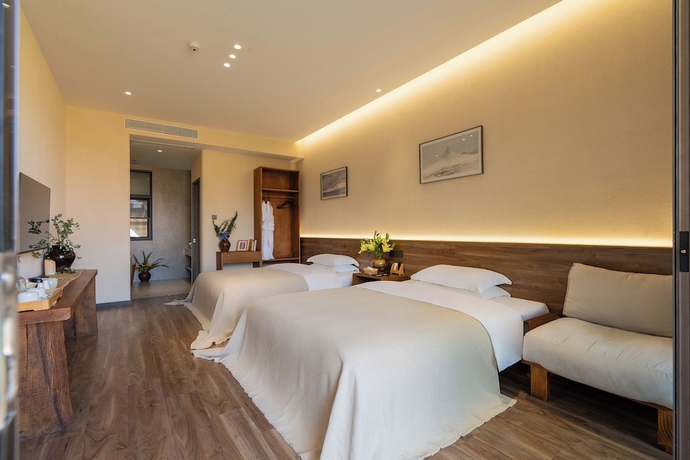 Imagen de la habitación del Hotel Dali Buxi Wellness Villa. Foto 14