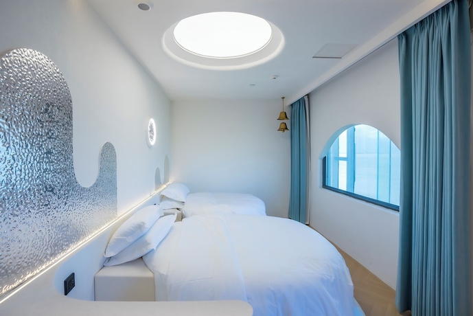 Imagen de la habitación del Hotel Dali Canghai Xueyue Seaview. Foto 12