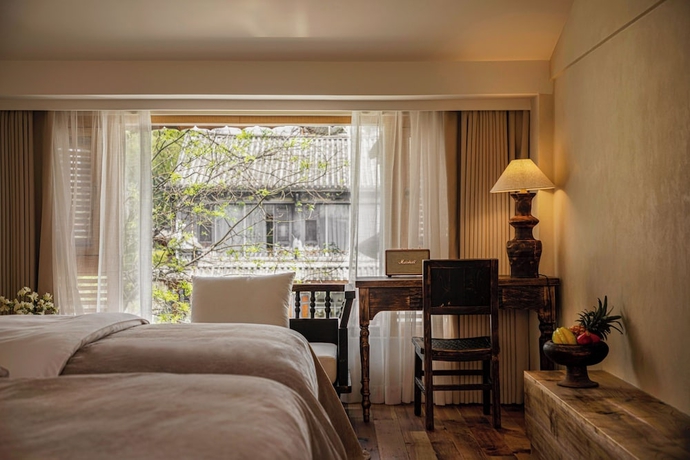Imagen de la habitación del Hotel Dali Jiwu. Foto 8