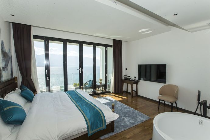 Imagen de la habitación del Hotel Dali Junbo Holiday Villa. Foto 5