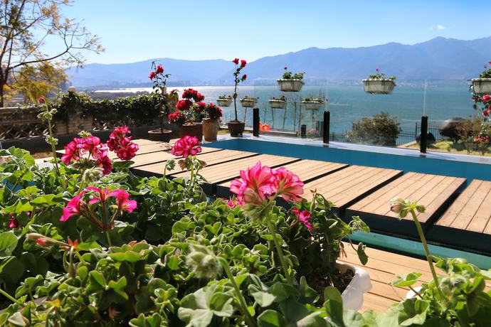 Imagen de la habitación del Hotel Dali Junbo Holiday Villa. Foto 7