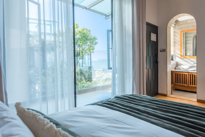 Imagen de la habitación del Hotel Dali Lanting Seaview Resort. Foto 5