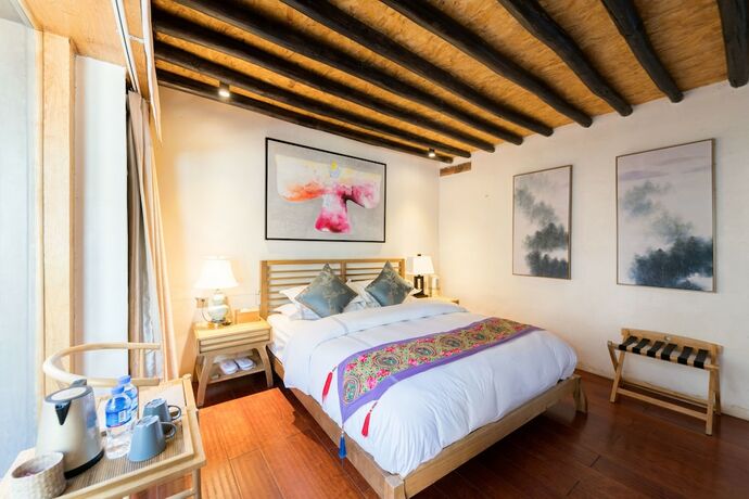 Imagen de la habitación del Hotel Dali Old Courtyard Boutique Inn. Foto 18