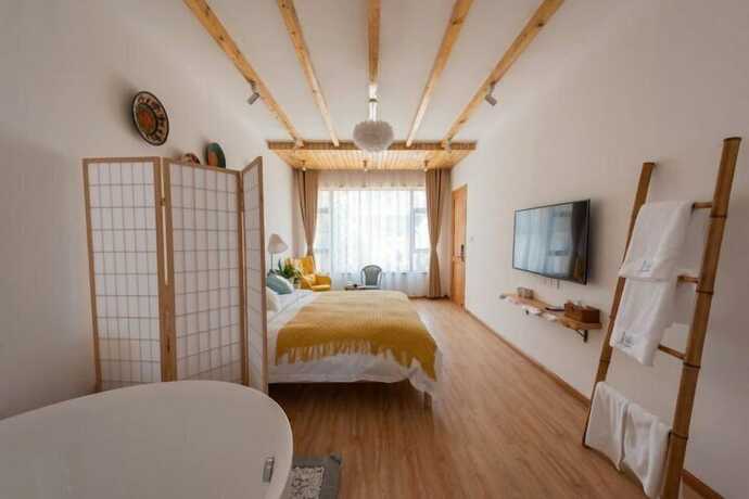 Imagen de la habitación del Hotel Dali Orchard Suites. Foto 11