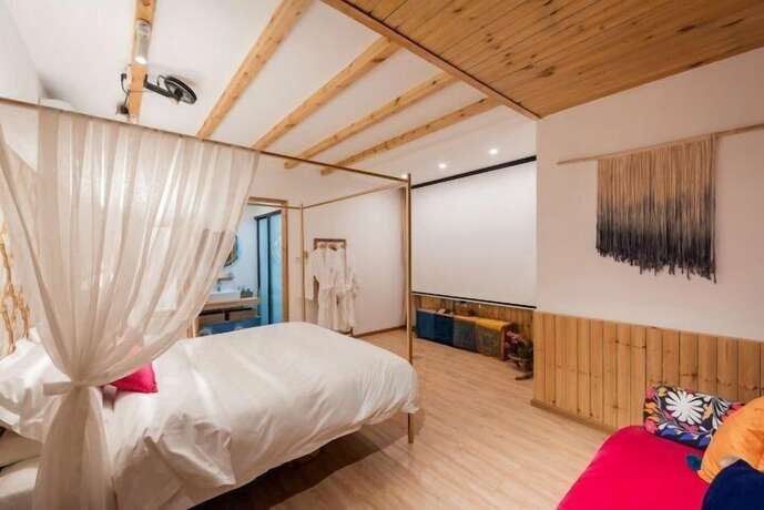 Imagen de la habitación del Hotel Dali Orchard Suites. Foto 14