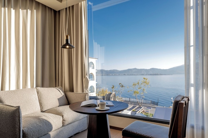 Imagen de la habitación del Hotel Dali Qingmai Seaview Resort. Foto 10