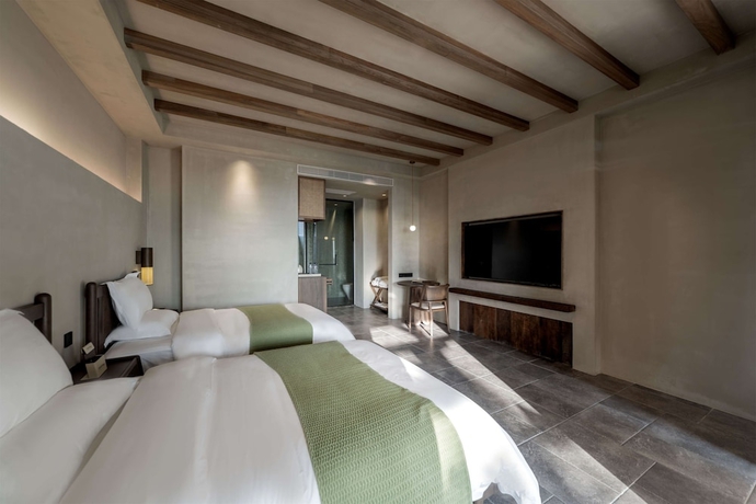 Imagen de la habitación del Hotel Dali Qingmai Seaview Resort. Foto 12