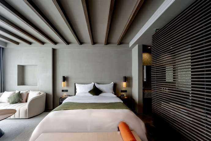 Imagen de la habitación del Hotel Dali Qingmai Seaview Resort. Foto 13