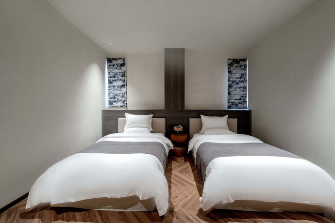 Imagen de la habitación del Hotel Dali Qingmai Seaview Resort (North Courtyard). Foto 9
