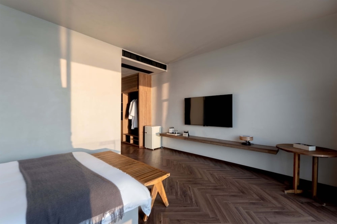 Imagen de la habitación del Hotel Dali Qingmai Seaview Resort (North Courtyard). Foto 12