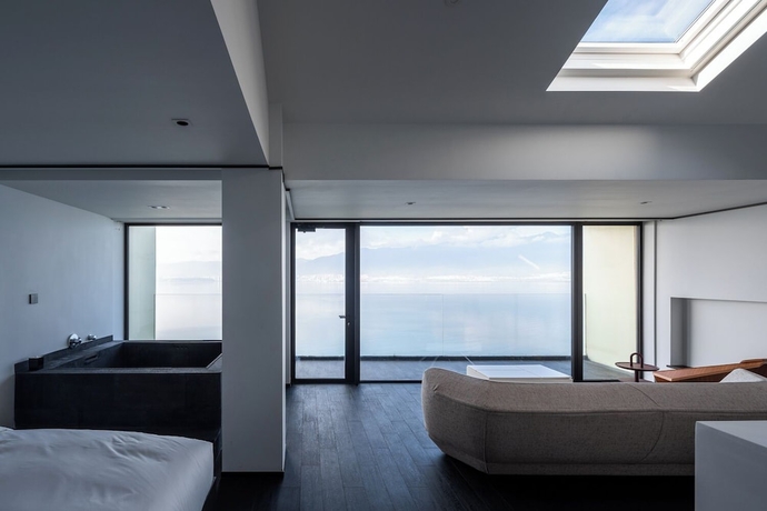 Imagen de la habitación del Hotel Dali Shijiushan Cliff Seavilla. Foto 5