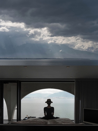 Imagen de la habitación del Hotel Dali Shijiushan Cliff Seavilla. Foto 8
