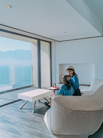 Imagen de la habitación del Hotel Dali Shijiushan Cliff Seavilla. Foto 9