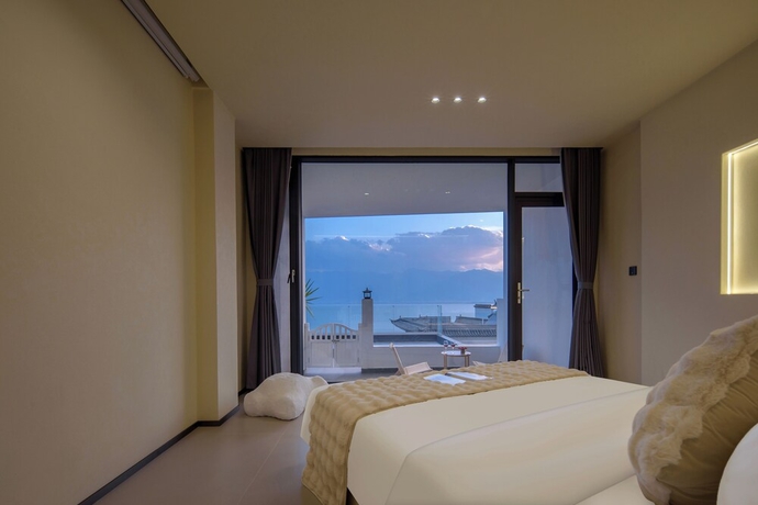 Imagen de la habitación del Hotel Dali Shuanglang Haiyu Mountain Sea View. Foto 15