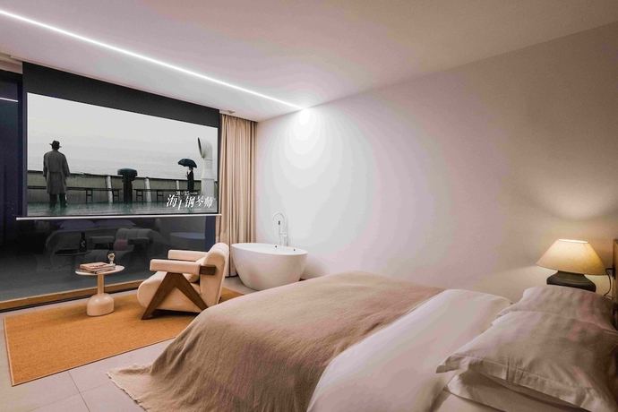 Imagen de la habitación del Hotel Dali Sky and Erhai Sea View Holiday Inn. Foto 5