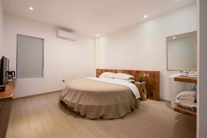 Imagen de la habitación del Hotel Dali Sky and Erhai Sea View Holiday Inn. Foto 9