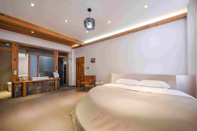 Imagen de la habitación del Hotel Dali Sky and Erhai Sea View Holiday Inn. Foto 13