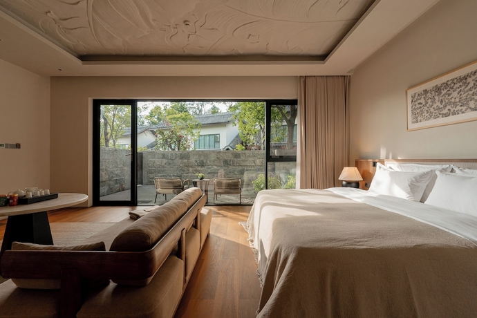 Imagen de la habitación del Hotel Dali Taoxi Secret Manor. Foto 4
