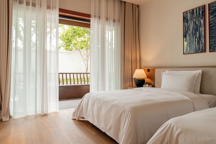 Imagen de la habitación del Hotel Dali Taoxi Secret Manor. Foto 9