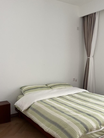 Imagen de la habitación del Hotel Dali Tourism Center High-end Community. Foto 4