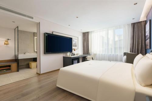 Imagen de la habitación del Hotel Dalian Airport Yingke Road Atour Hotel. Foto 12