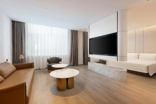 Imagen de la habitación del Hotel Dalian Airport Yingke Road Atour Hotel. Foto 13