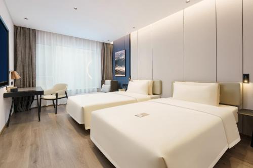 Imagen de la habitación del Hotel Dalian Airport Yingke Road Atour Hotel. Foto 16