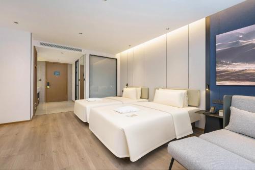 Imagen de la habitación del Hotel Dalian Airport Yingke Road Atour Hotel. Foto 18