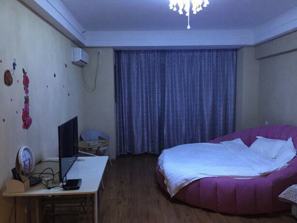 Imagen de la habitación del Hotel Dalian Blazing Sun Seaview Apartment. Foto 6