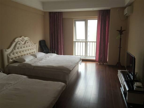 Imagen general del Hotel Dalian Blazing Sun Seaview Apartment. Foto 4