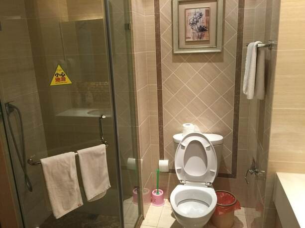 Imagen de la habitación del Hotel Dalian Blazing Sun Seaview Apartment. Foto 7