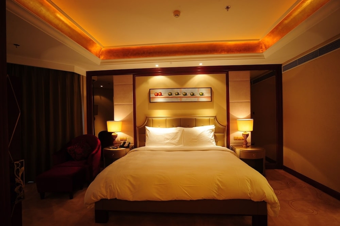 Imagen de la habitación del Hotel Dalian Dynasty International. Foto 6
