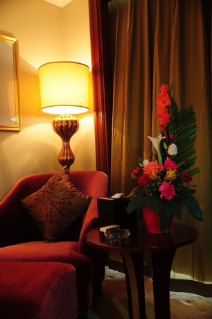 Imagen de la habitación del Hotel Dalian Dynasty International. Foto 13