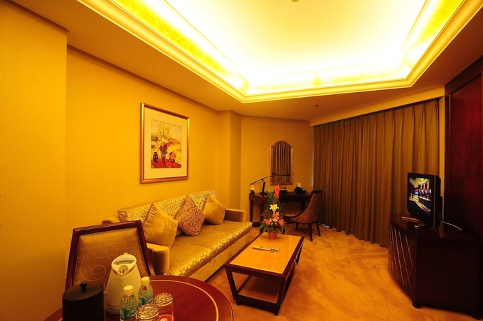 Imagen de la habitación del Hotel Dalian Dynasty International. Foto 15
