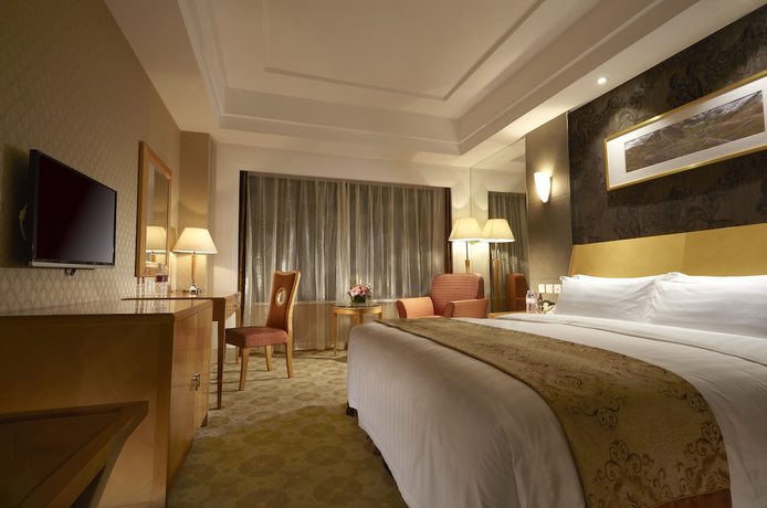 Imagen de la habitación del Hotel Dalian East. Foto 7