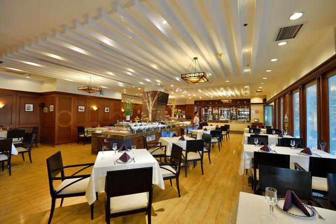 Imagen del bar/restaurante del Hotel Dalian East. Foto 4