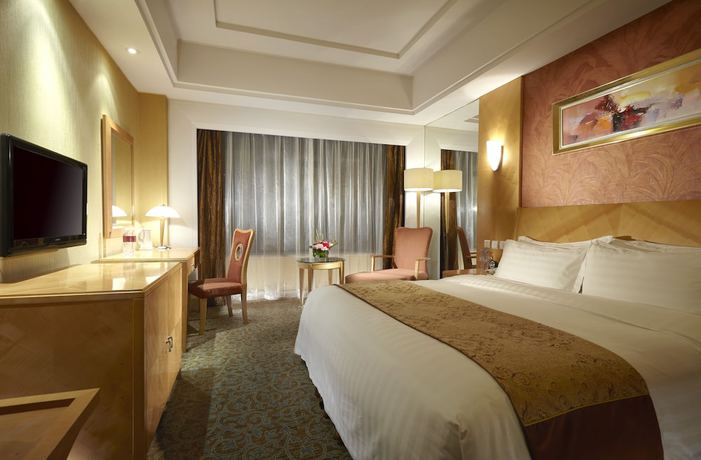 Imagen de la habitación del Hotel Dalian East. Foto 10