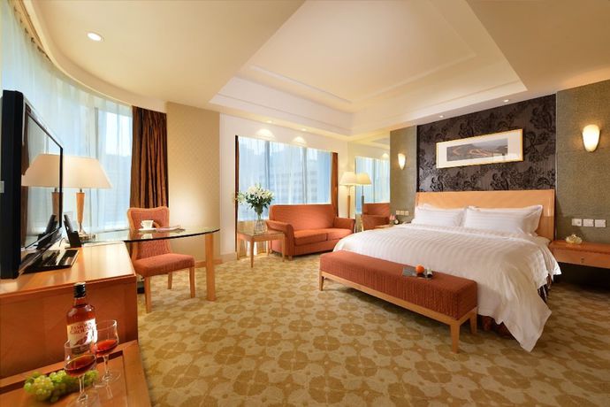 Imagen de la habitación del Hotel Dalian East. Foto 13