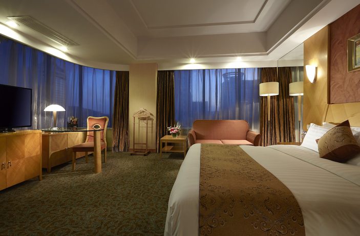 Imagen de la habitación del Hotel Dalian East. Foto 14