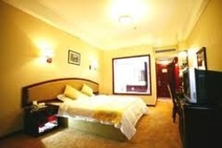 Imagen de la habitación del Hotel Dalian Everbright. Foto 3