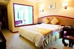 Imagen de la habitación del Hotel Dalian Everbright. Foto 4
