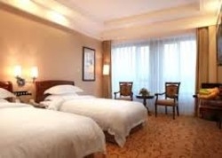 Imagen de la habitación del Hotel Dalian Greatwall. Foto 4